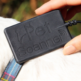 Close up PetScanner microchip reader scanning a dog
